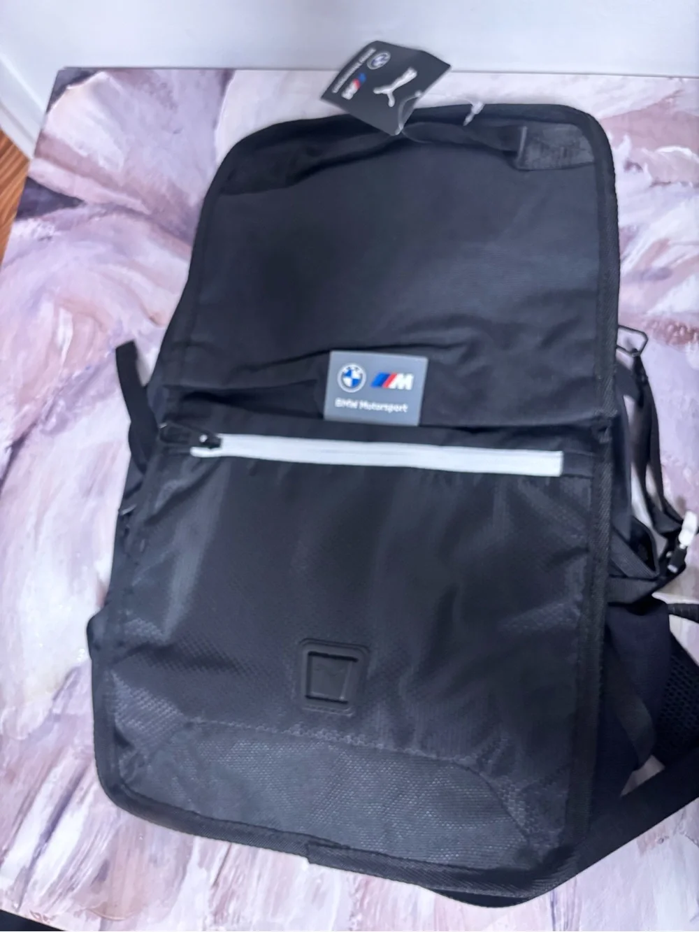BMW Black Backpack with White Zipper Accent